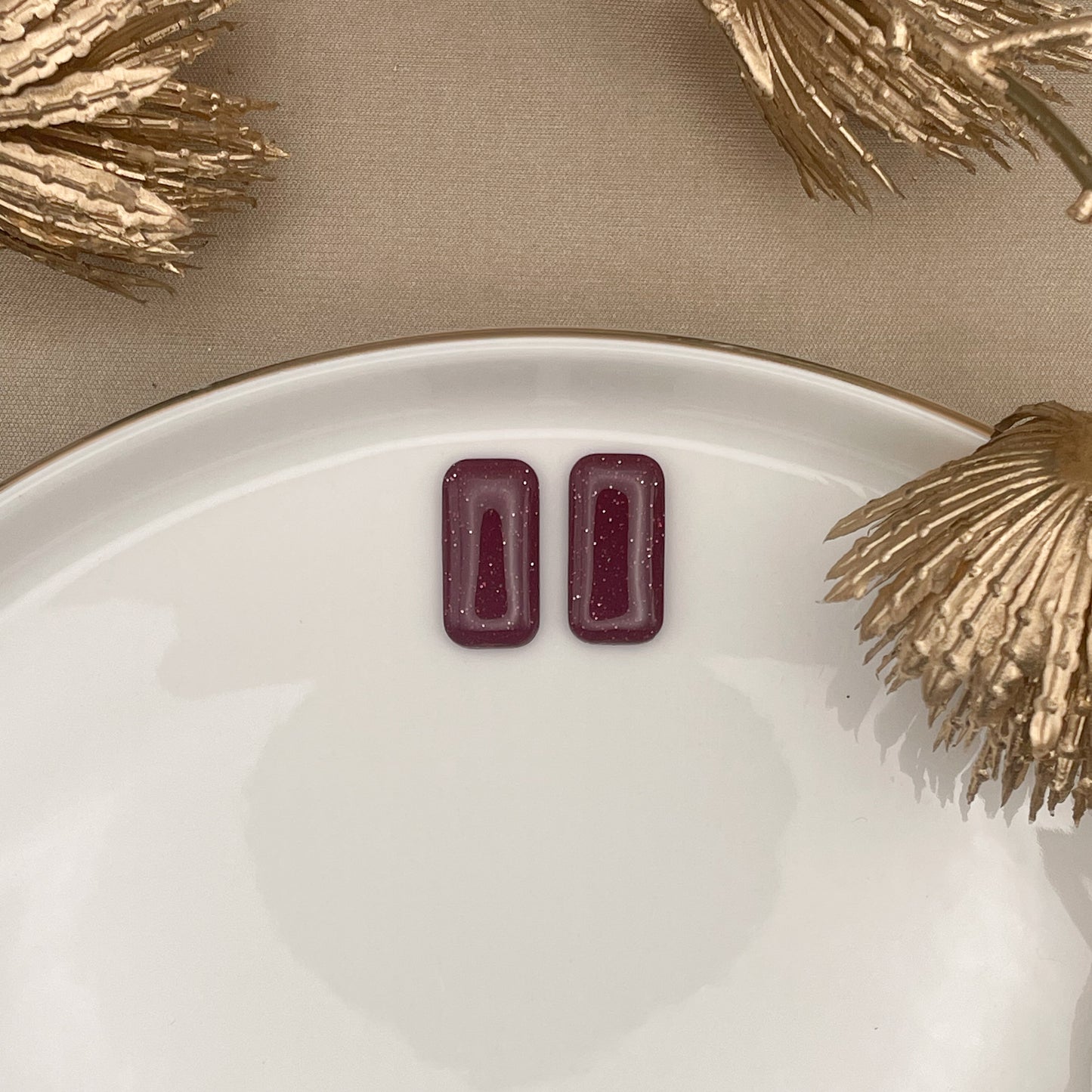 Stud bordeaux glitter