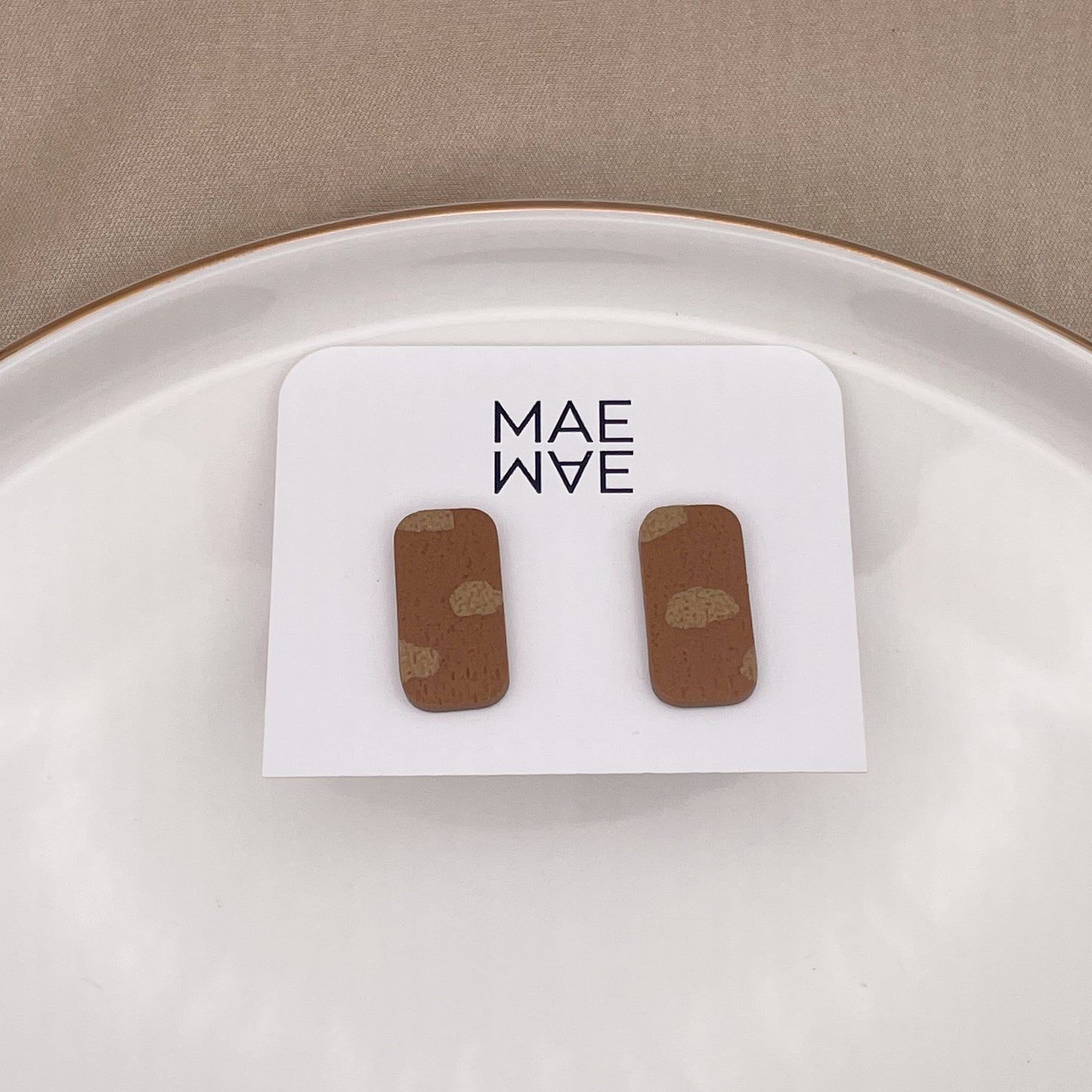 STUD karamel gevlekt