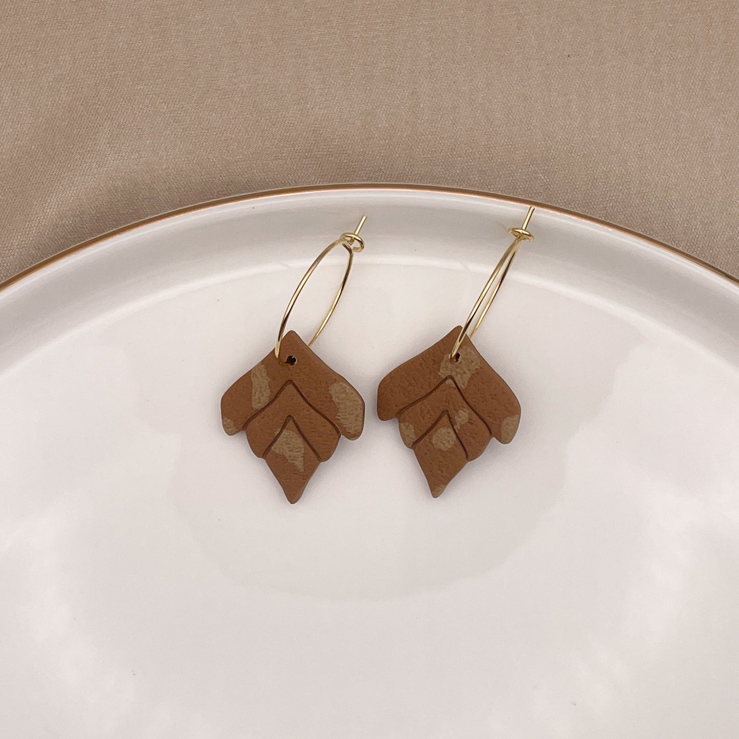 NOVA blad, bruin gevlekt